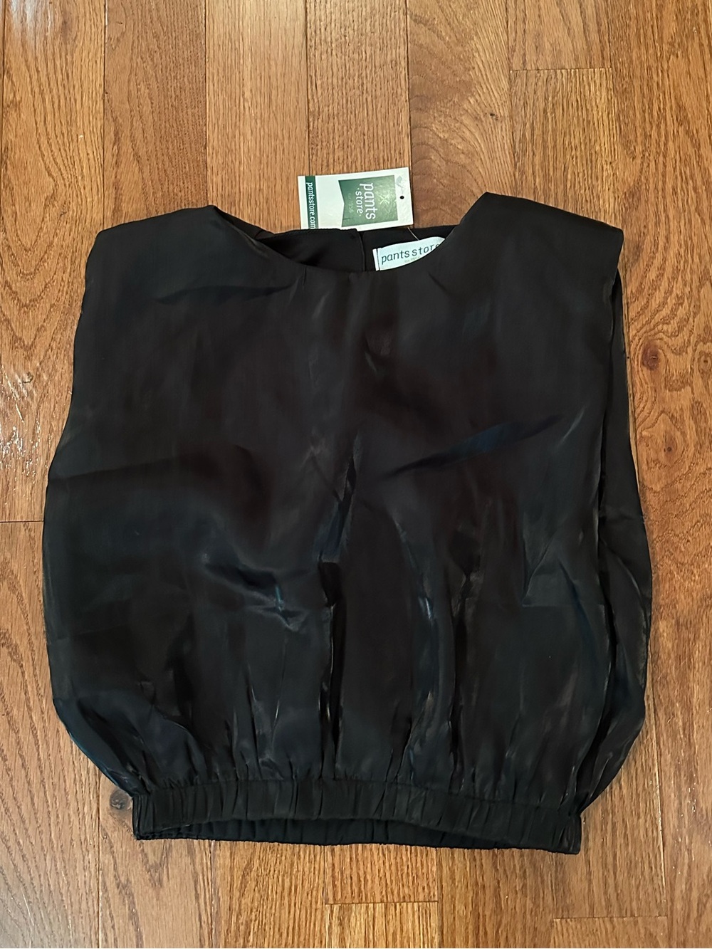 NWT shiny black crop top with cinched waist from the pants store size medium